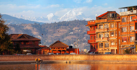 BHAKTAPUR, NEPAL. Nepal attractions. View from the medieval pool Na Pukhu, overlooking the Himalayas.