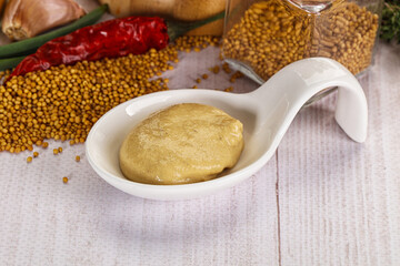 Dijon mustard sauce in the bowl