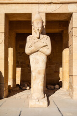 Osiris pillar in the mortuary temple of Hatshepsut in the necropolis Deir el-Bahari of Thebes, Egypt, Luxor