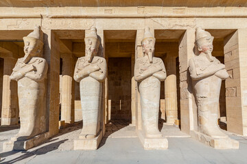 Osiris pillar in the mortuary temple of Hatshepsut in the necropolis Deir el-Bahari of Thebes, Egypt, Luxor