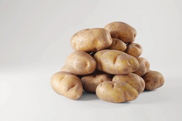 Fototapeta premium Close up shot of a bunch of potatoes on white background.