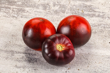 Black ripe juicy organic tomato