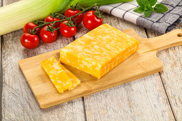 Marble yellow cheese with slices