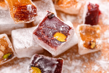 Sweet food Turkish delight, assorted rahat locum in form of cubes with nuts and powdered sugar, traditional food