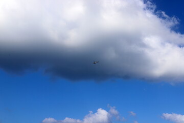 white clouds are floating across the sky