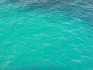 Blue navy ocean water surface background.