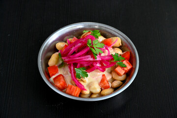 Turkish Etli Kuru Fasulye food with Traditional Turkish table with decoration. Nohut yemegi. Pilav ustu, kuru fasulye, nohut. Gunun menusu.