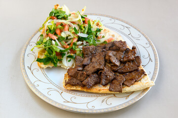 Meatball between bread (Turkish name : ekmek arasi kofte ) Izgara kofte. Manisa, Akcaabat, Akhisar  kofte. Delicious meat grilled meatballs.