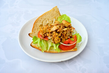 Meat Chicken Doner, between bread (Turkish Name : ekmek arasi et doner, tavuk doner, Gobit ekmek arasi, Turk kebabi)