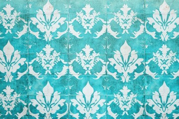 A decorative wall with a geometric pattern in shades of blue and white