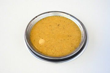 Turkish Ezo Gelin soup, Traditional Turkish Soup. Geleneksel Ezogelin corbasi. Ezogelin Soup Served with a slice of lemon. Top view