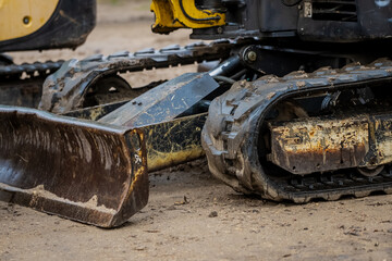 Industrial equipment rubber material tracks and excavator blade for scraping and leveling ground