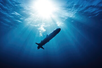 Obraz premium An airplane flying high above a clear blue sky, suitable for travel or aviation-themed images