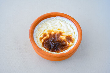 Baked rice pudding turkish milky dessert sutlac, keskul  (Turkish name; firin sutlac). Findikli Hamsikoy Sutlac