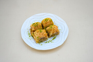 Turkish Dessert Sobiyet, havuc dilimi, midye baklava, mussels baklava and classic baklava with Pistachio . Cikolatali cevizli, fistikli soguk Baklava, top view.