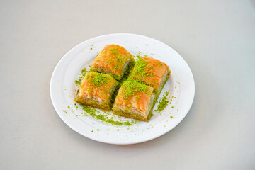 Turkish Dessert Sobiyet, havuc dilimi, midye baklava, mussels baklava and classic baklava with Pistachio . Cikolatali cevizli, fistikli soguk Baklava, top view.