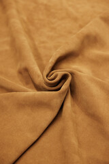 Leather texture: Elegant folds and shading A representation of high quality leather with visible...