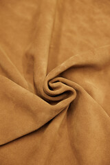 Leather texture: Elegant folds and shading A representation of high quality leather with visible wrinkles and shading that highlight the softness and structure of the material.