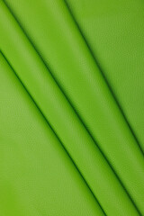 Leather texture: Elegant folds and shading A representation of high quality leather with visible wrinkles and shading that highlight the softness and structure of the material.