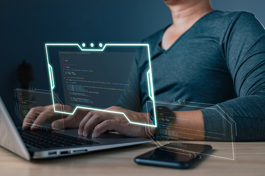 A programmer engaged in coding demonstrates the essence of technology, merging skill and innovation to craft efficient solutions and drive advancements in the ever-evolving digital landscape.