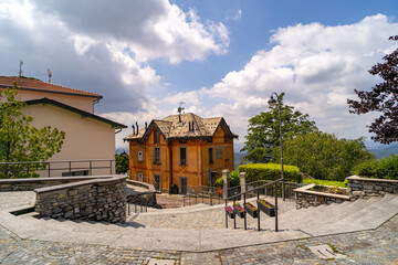 Rustic House with Scenic Pathway and Garden