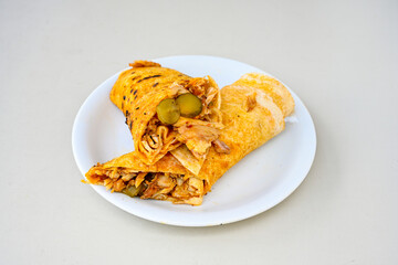 Lavash doner kebab ( soslu kasarli zurna doner durum )  or shawarma sliced in plate isolated.  Tavuk Et Doner Durum. Hatay Iskenderun usulu bazuka, zurna  tavuk doner durum. 