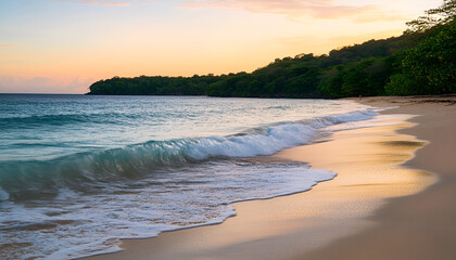 Obraz premium Scenic Beach with Gentle Waves at Sunset
