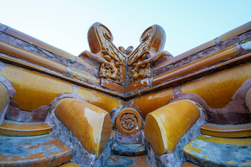 Yellow Chinese glazed roof tile on Tibetan architecture in the Four Great Regions Scenic Area of Summer Palace in Beijing