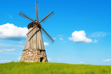 beautiful old wind mil , breen grass and blue sky
