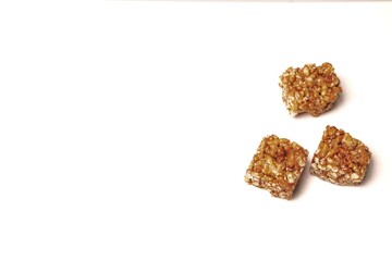 Jipang or berondong is indonesian traditional snack. Made from rice, corn coated with sweet caramel. Isolated white background