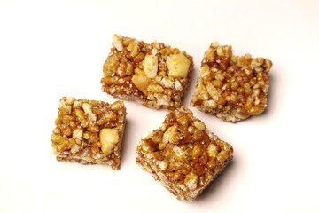 Jipang or berondong is indonesian traditional snack. Made from rice, corn coated with sweet caramel. Isolated white background