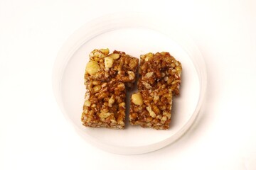 Jipang or berondong is indonesian traditional snack. Made from rice, corn coated with sweet caramel. Isolated white background