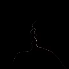 two girls kissing dark low key © Natan