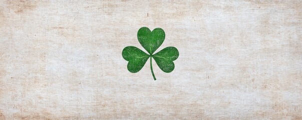 Discover a subtle shamrock leaf, a symbol of luck and heritage, gracefully displayed against a rich woven cultural fabric background This image captures depth and authenticity, portraying the essence