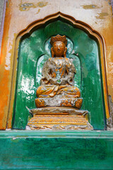 Obraz premium glazed Buddha on the wall of the Wisdom-Sea Temple, The Liangless Buddha Temple at the top of Wanshou Mountain in Summer Palace in Beijing.