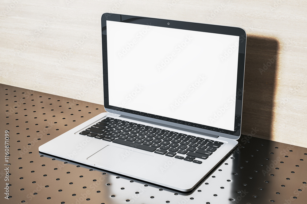 Poster Modern open laptop with blank white screen on a metallic perforated table in a clean, bright setting. 3D Rendering