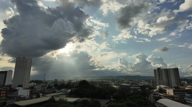timelapse of sunset clouds over the skyline of Davao City with Mount Apo in the background