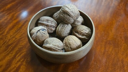 walnuts on a bowl. nuts