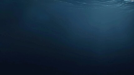 Deep, dark ocean water surface view from below.