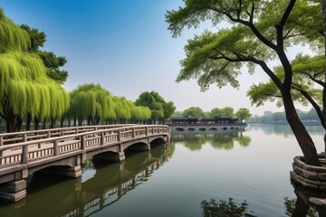 trees are growing along the water near a bridge and a boat