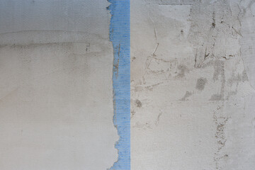 Photo of unfinished plastering on a wall.
