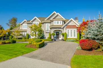 Two story luxury house with beautiful summer landscape in Vancouver, Canada, North America. Day time on June 2024.