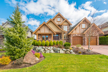 Two story luxury house with beautiful summer  landscape in Vancouver, Canada, North America. Day...