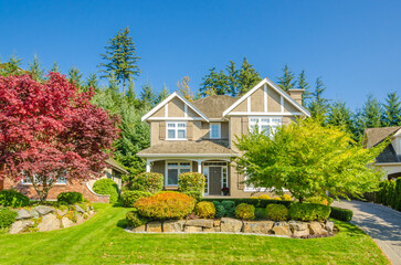 Two story luxury house with beautiful summer  landscape in Vancouver, Canada, North America. Day...