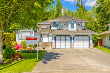 Two story luxury house with beautiful summer  landscape in Vancouver, Canada, North America. Day...