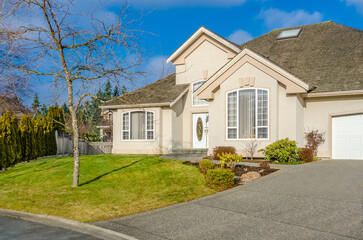 Two story luxury house with beautiful summer  landscape in Vancouver, Canada, North America. Day time on June 2024.