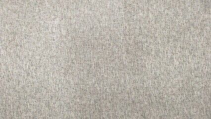 A white fabric with a pattern of small squares