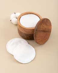 Wooden cotton pad container with reusable organic cotton pads