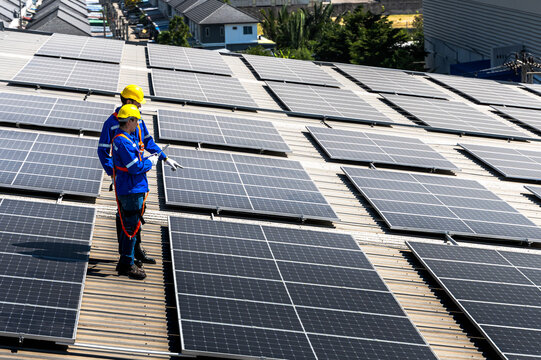 Solar engineers men working on rooftop