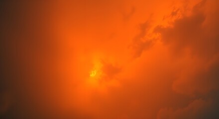 A vibrant orange sky with fluffy clouds and a bright sun, evoking a sense of warmth and tranquility.